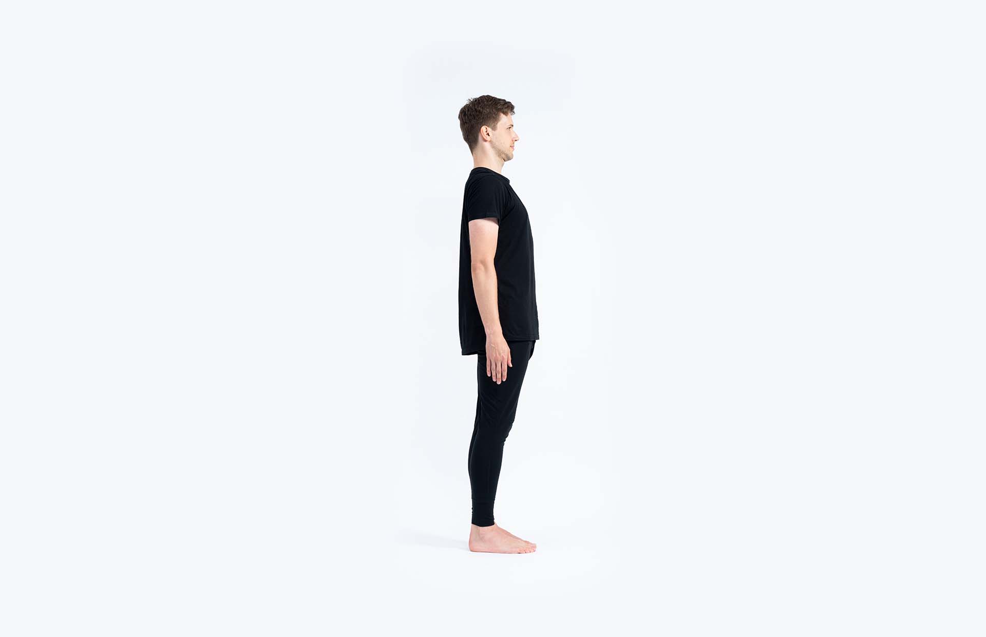 A person standing in Tadasana (Mountain Pose)