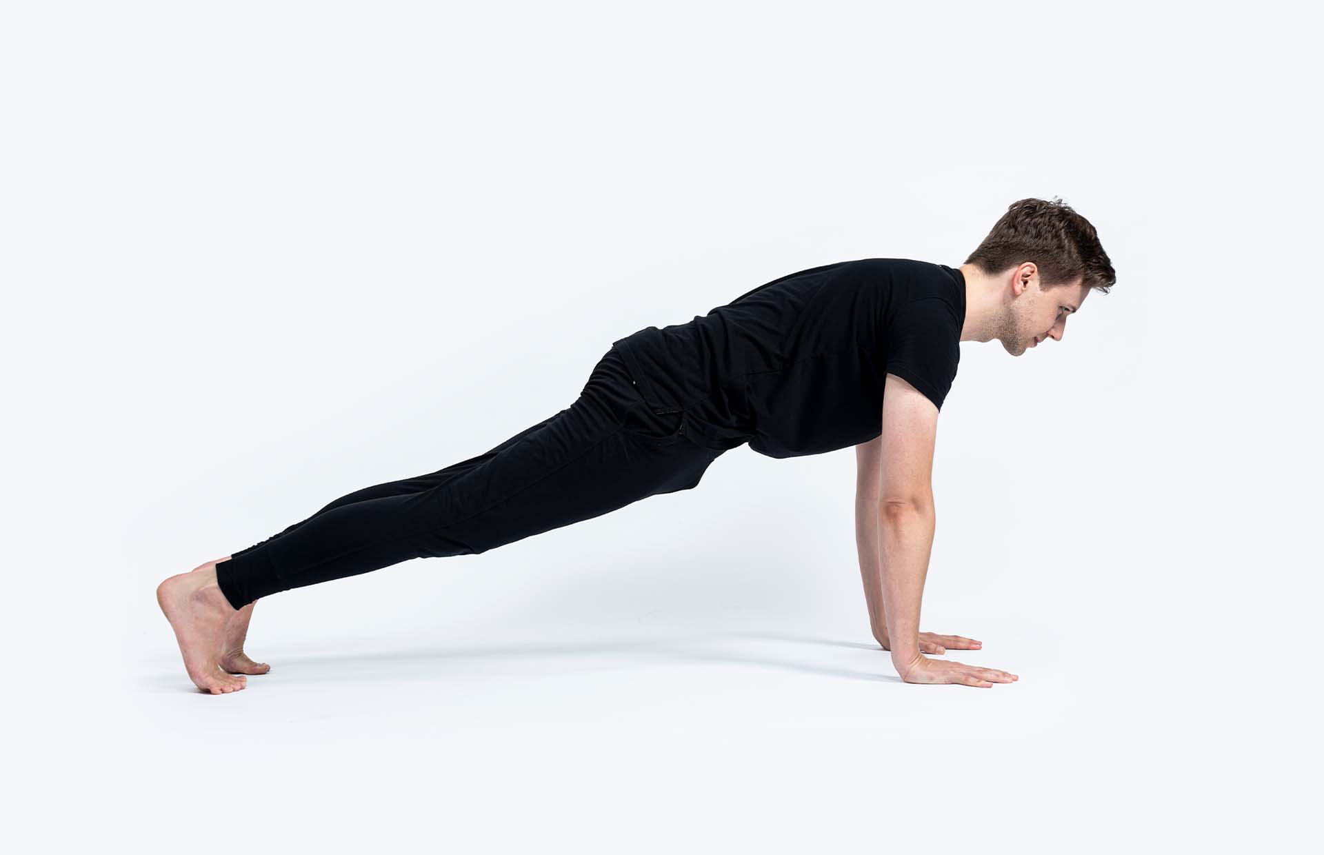 A person holding Phalakasana (Plank Pose)