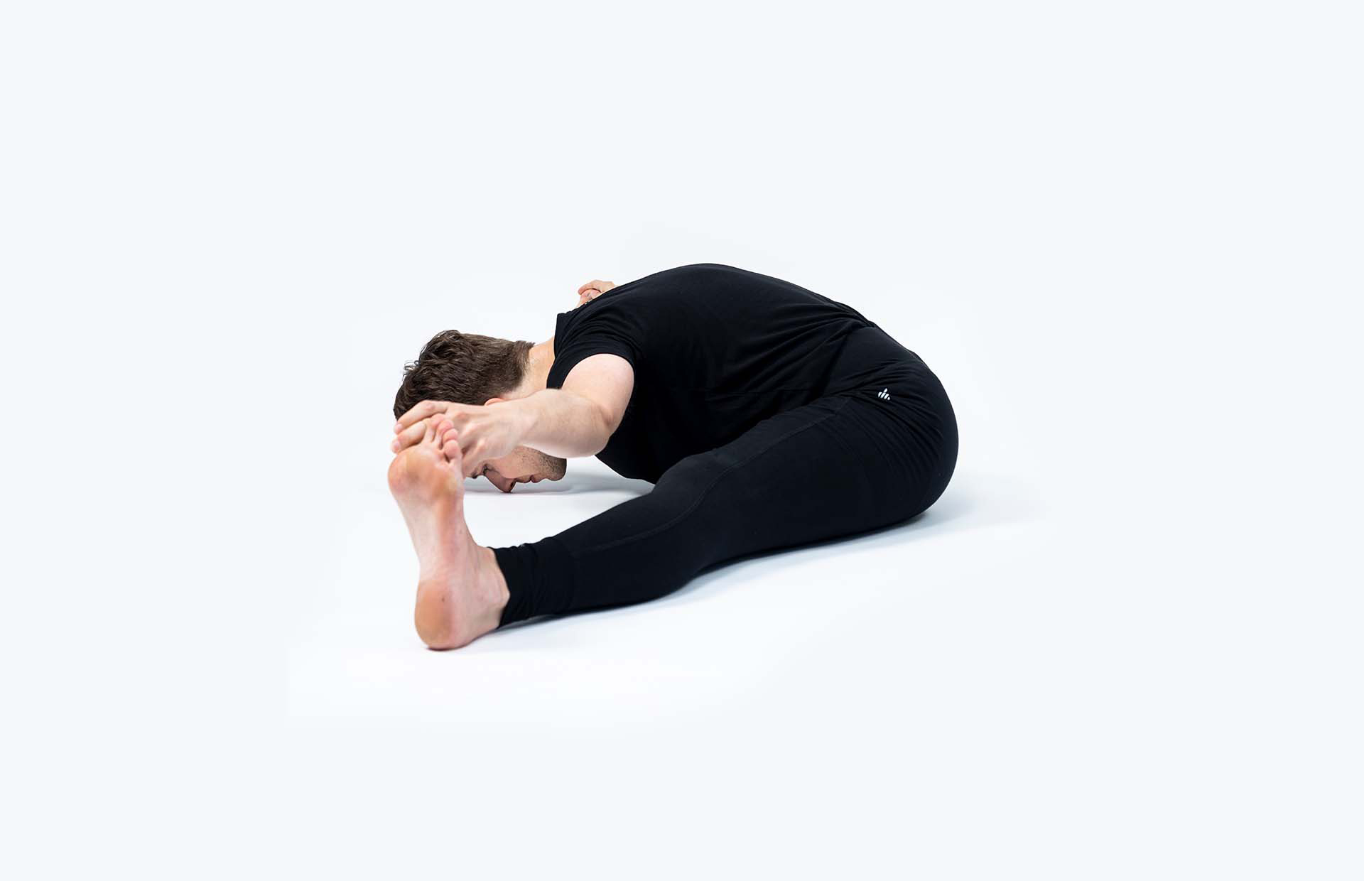 A person in Upavista Konasana