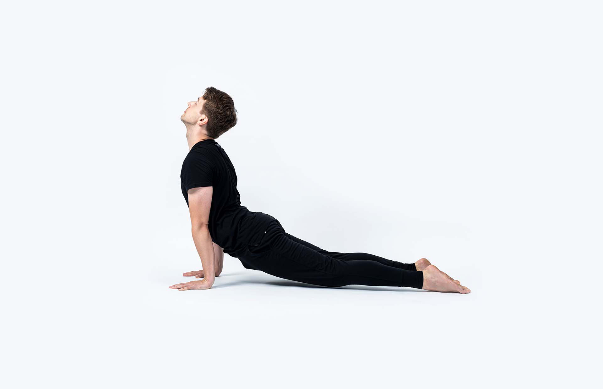 A person in Urdhva Mukha Svanasana (Upward Facing Dog)